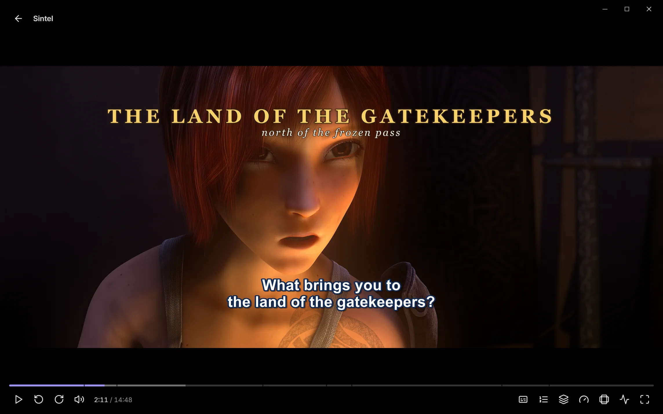 Sintel paused in the desktop app's player, with a gold sign reading The land of the gatekeepers above a styled subtitle