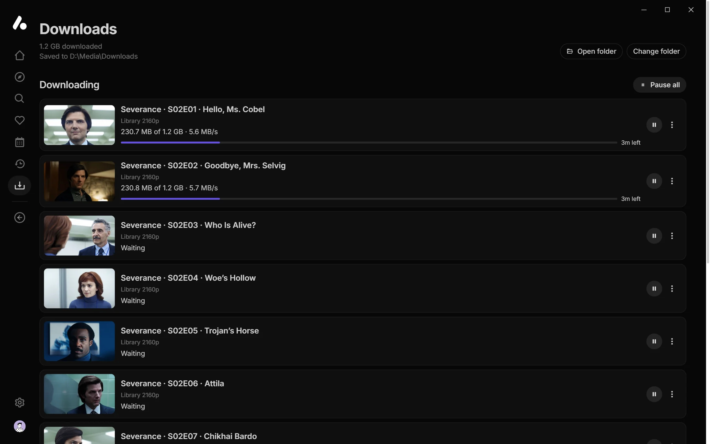 The desktop app's Downloads page, with two episodes of Severance downloading and the rest of the season waiting
